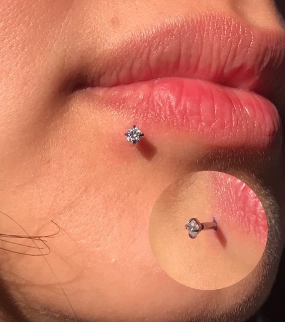 Dawnon InstagramFresh freehand off centred labret piercing done for my lovely clientShe chose this stunning titanium prong set clear cubic zirconia stone for some sparklePrepped with @purklenz Pierced using @thatsthepointuk blades Cooled with @neilmedpiercingaftercare To book an appointmentClick the link in my bioEmail medawnpierced@gmail.comMessage me directly pierced piercings piercer bodypiercer femalebodypiercer irishbodypiercer safepiercing piercer Lip Percing, Effy Stonem Style, Lips Piercing, Piercing Labret, Face Piercings, Lip Makeup Tutorial, Labret Piercing, Cute Piercings, Eyebrow Piercing