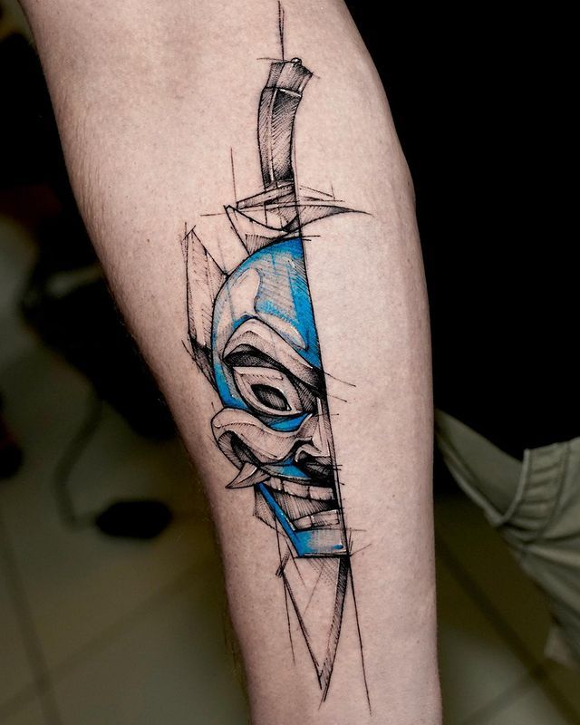 a tattoo on the leg of a person with a knife