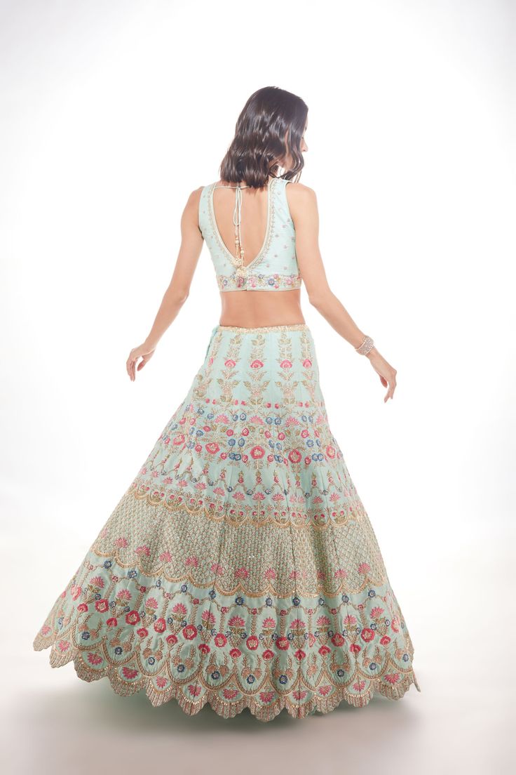 A silk lehenga with zardozi, sequins, and resham embroidery paired with a matching blouse and net dupatta with a floral border From Chamee and Palak The Wedding Edit collectionDELIVERY TIMEPlease allow 8-12 weeks for your outfit to arrive.FABRIC DETAILSSilk And NetProfessional cleaning only. Mint Green And Pink, Wedding Edit, Resham Embroidery, Silk Lehenga, Net Dupatta, 12 Weeks, Green And Pink, Floral Border, Green Silk