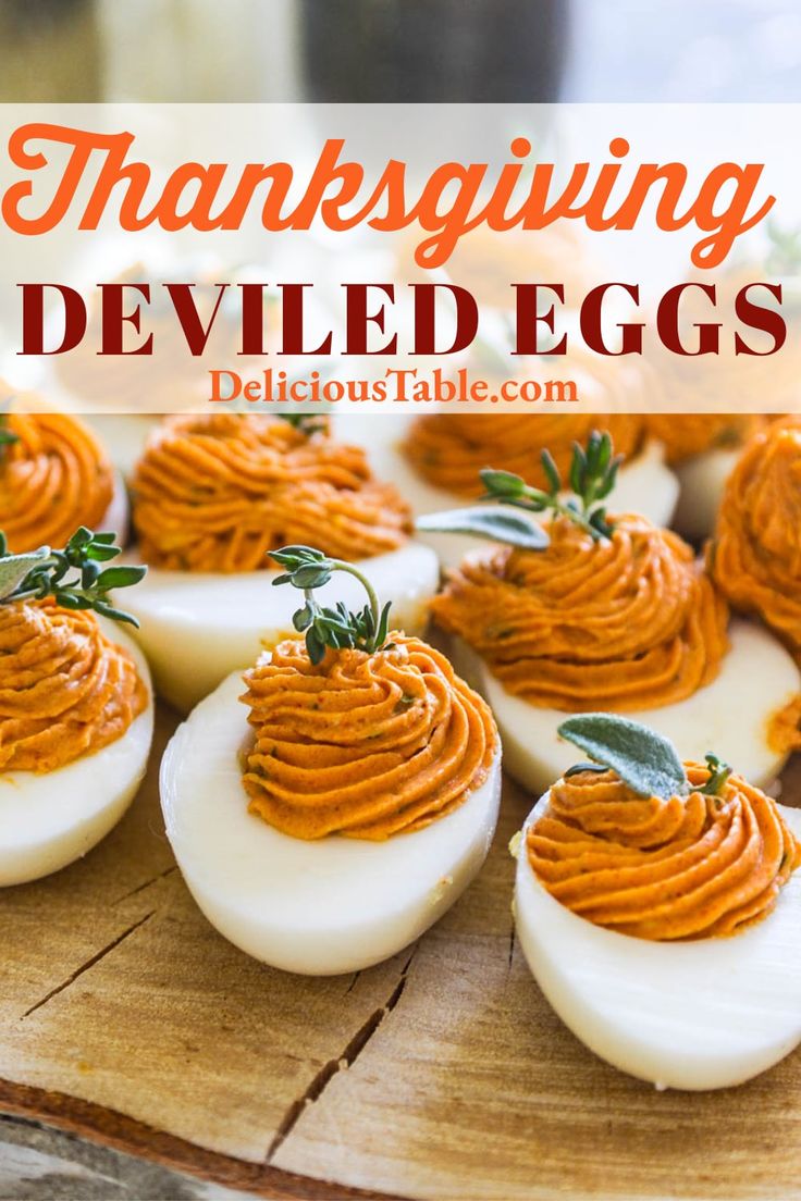 some deviled eggs are sitting on a cutting board with the words, thanksgiving deviled eggs