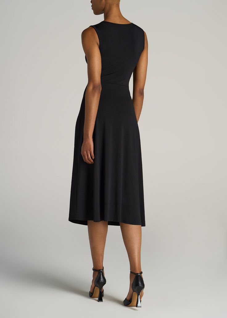 About Our Tall Women's Sleeveless Knot Front Dress Your casual companion to brunches, boardwalks and weekend getaways. This tall women's dress combines a breezy, sleeveless shape with a midi-length skirt that sits just right. Thanks to an elegant knot detail at the waist, it has an A-line shape that flatters your figure and fits it properly. It's made with a stretch-infused poly blend that's been shrinkage controlled, because it's hard enough to find tall dresses without worrying about losing le Casual Sleeveless Midi Dress With Flattering Silhouette, Flattering Fit And Flare Sleeveless Midi Dress, Flattering Black Sleeveless Midi Dress, Flattering A-line Sleeveless Dress For Summer, Casual A-line Sleeveless Dress For Evening, Black Sleeveless Dress With Flattering Silhouette For Summer, Casual A-line Sleeveless Evening Dress, Flattering Black Maxi Dress For Summer, Sleeveless Maxi Dress With Flattering Silhouette For Summer