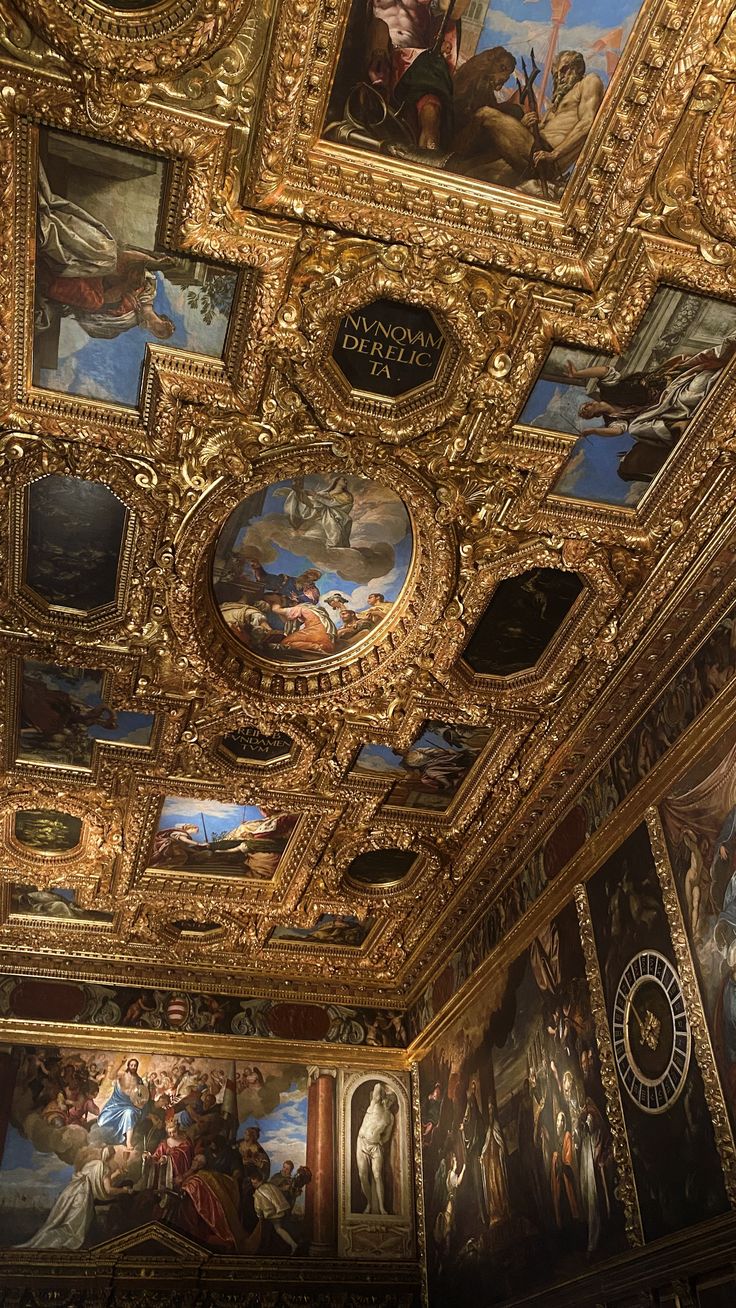 an ornate ceiling with paintings on it