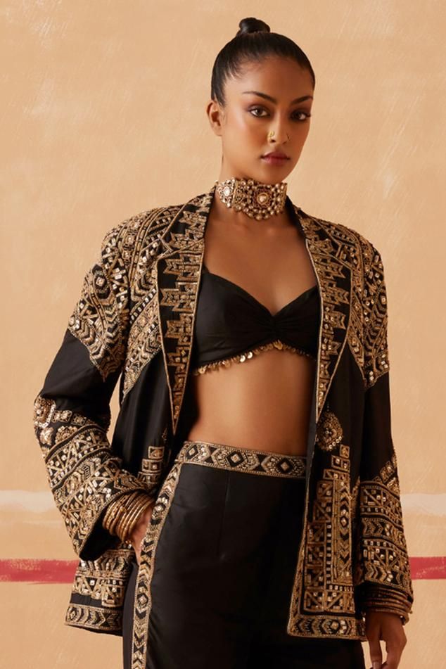 Black silk full sleeve jacket with sequin, bead, cutdana, thread embroidery in geometric pattern. Paired with blouse and pant. - Aza Fashions Festive Party Blazer With Resham Embroidery, Festive Hand Embellished Long Sleeve Outerwear, Festive Long Sleeve Hand Embellished Outerwear, Traditional Fall Party Sets, Traditional Party Sets For Fall, Long Sleeve Party Outerwear With Intricate Embroidery, Long Sleeve Sequined Choli For Festivals, Elegant Festival Outerwear For Party, Elegant Outerwear For Parties And Festivals