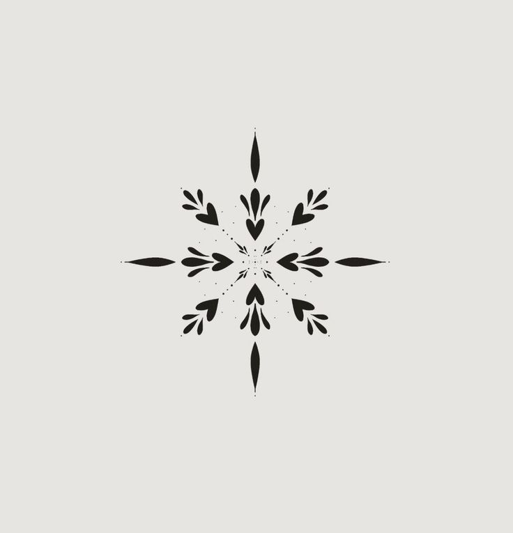 a black and white snowflake on a gray background