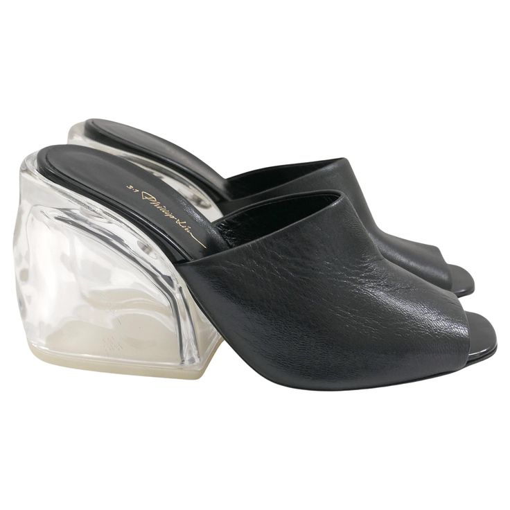 Stunning archival Phillip Lim plexi heel mules - bought for £650 and unworn with dustbag. Have soft black leather uppers/footbeds and super chunky, ice effect transparent resin heels. Size 36.5/UK3.5. Measure approx 9.75” heel to toe and heel 3.5”. Please note that internal irregularities in the plexi are part of the nature of this material. Ice Effect, Elevated Fashion, Transparent Resin, Heel Mules, Super Chunky, 3.1 Phillip Lim, Phillip Lim, My Shoes, Soft Black