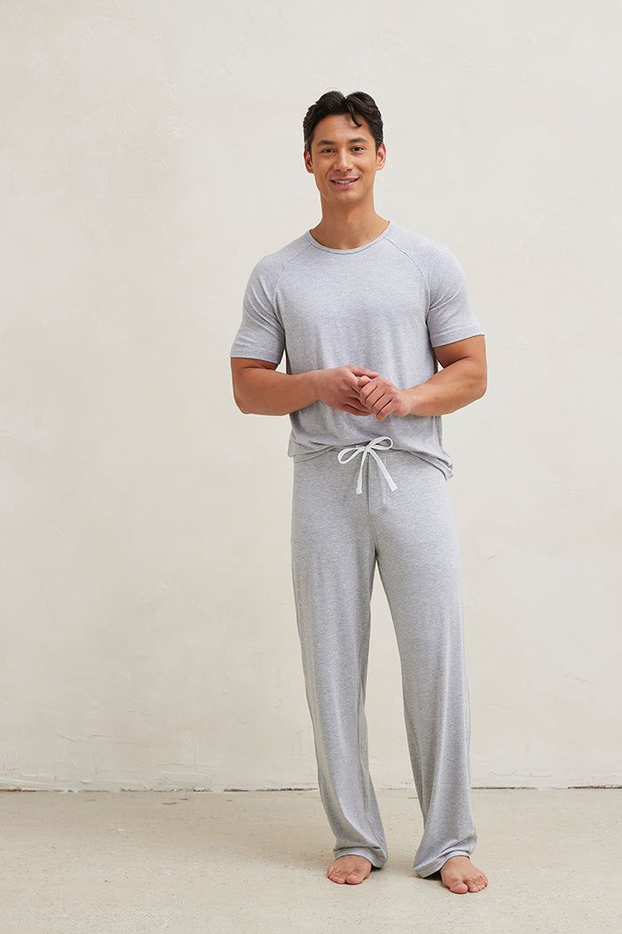 Introducing your stay at home uniform. Lounge in comfort all day in this incredibly soft and breathable pajama set. This set includes straight leg pajama pants and a matching raglan cut t-shirt. Made from our signature ultra-soft and moisture-wicking fabric blend. Made in Canada. 93% Viscose from Bamboo / 7% Spandex. Fits true to size. Available in S, M, L, XL. S (28-30), M (32-34), L (36-38), XL (40-42). Machine washable and dryer friendly. Lounge Wear Men, Night Fits, Mens Pajama, Soft Pajama Pants, Mens Pajama Pants, White Pajamas, Mens Pajamas Set, Summer 2025, Mens Sleepwear