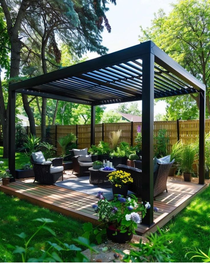 an outdoor patio area with furniture and plants