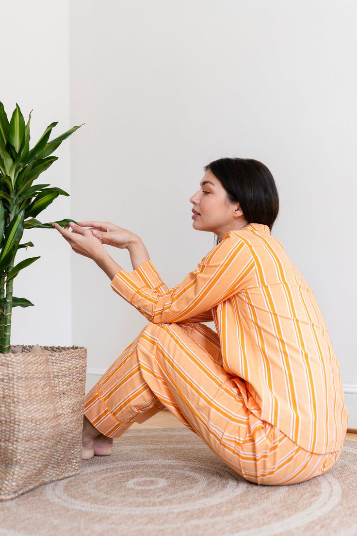 Light as a feather and soft as a dream, our long sleeve pajama set is designed to help you enjoy the comfiest sleep of your life, all year round. Once you experience the feel of our 100% organic cotton on your skin, you’ll want to go to bed early, sleep in, and lounge all day in your chic, luxurious pajama set. Like all our loungewear, this pajama set is lovingly crafted to help you be beautifully and fearlessly yourself, and its screen-printed pattern is one-of-a-kind, just like you. Take some Organic Cotton Long Sleeve Sleepwear For Spring, Relaxed Cotton Sleepwear For Pajama Party, Relaxed Long Sleeve Sleepwear For Lounging, Relaxed Fit Long Sleeve Sets, Spring Organic Cotton Sleepwear, Spring Organic Cotton Loungewear Sets, Organic Cotton Loungewear Sets For Spring, Relaxed Fit Organic Cotton Sleepwear For Lounging, Relaxed Long Sleeve Cotton Sleepwear