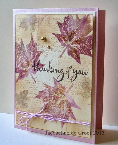 a card with some leaves on it