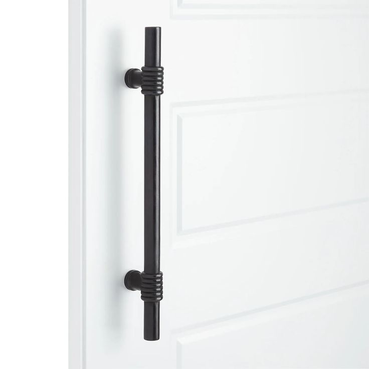 an open door with a black handle on it