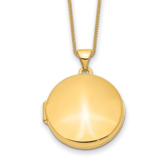 A shimmering curved top accentuates this meaningful domed locket necklace. Fashioned in 14K yellow gold, the 18-inch box chain secures in place with a spring ring clasp. Classic Gold Locket Necklace With Polished Finish, Classic Gold Round Locket Necklace, Classic Yellow Gold Round Pendant Locket Necklace, Gold Domed Jewelry Gift, Classic Gold Locket Necklace For Keepsake, Classic Round Locket Necklace For Keepsake, Classic Yellow Gold Round Locket Necklace, Classic Round Yellow Gold Locket Necklace, Gold Locket Necklace With Round Disc