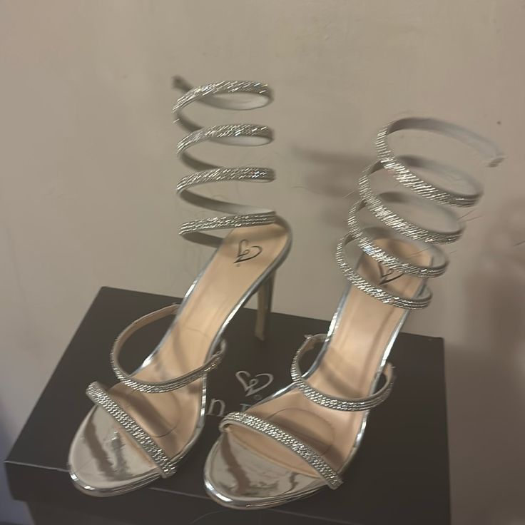 Silver Wrap Heels, Silver Wrap Around Heels, Heels For Sweet 16, Black Glittery Heels, Silver Strappy Heels Prom, Prom Shoes Ideas, Silver Shoes For Prom, Cute Heels For Prom, Silver Heels Aesthetic