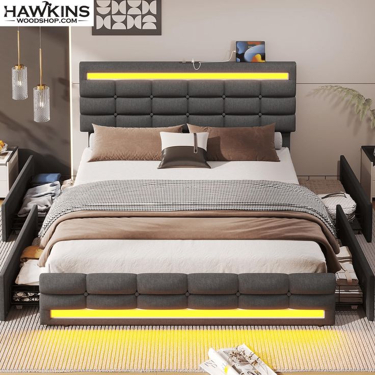 a modern bedroom with an upholstered bed and yellow lights on the headboard