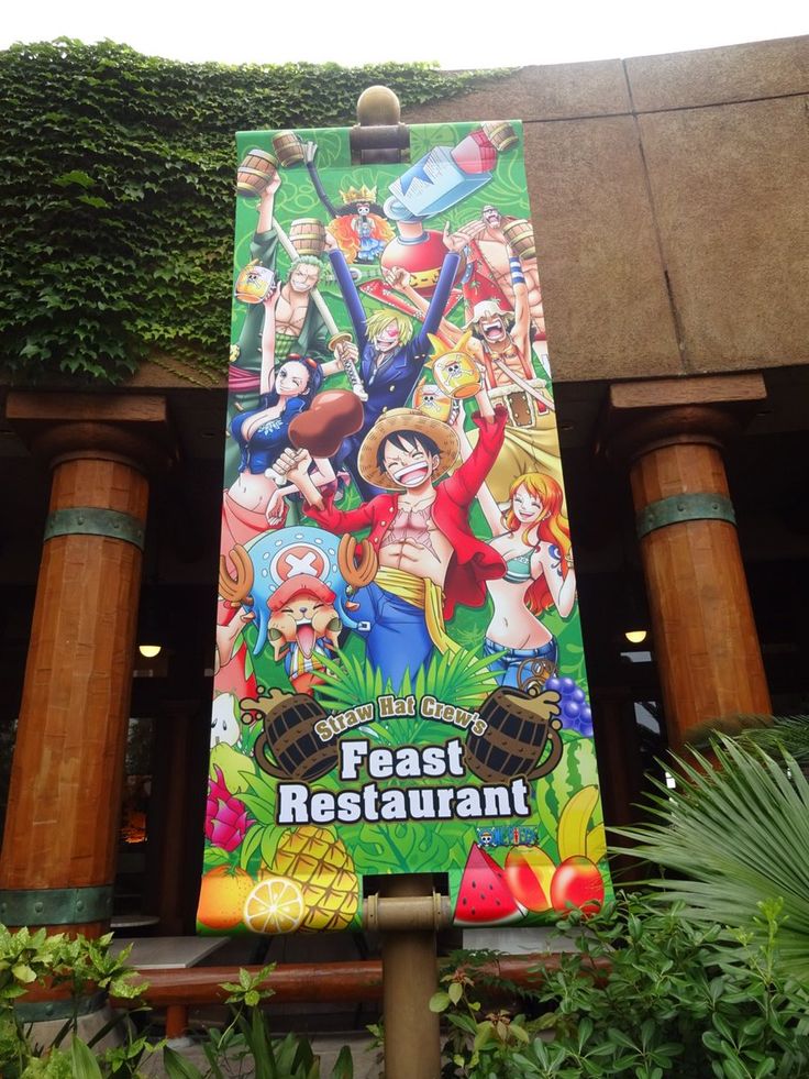 a sign for an outdoor restaurant with cartoon characters on it