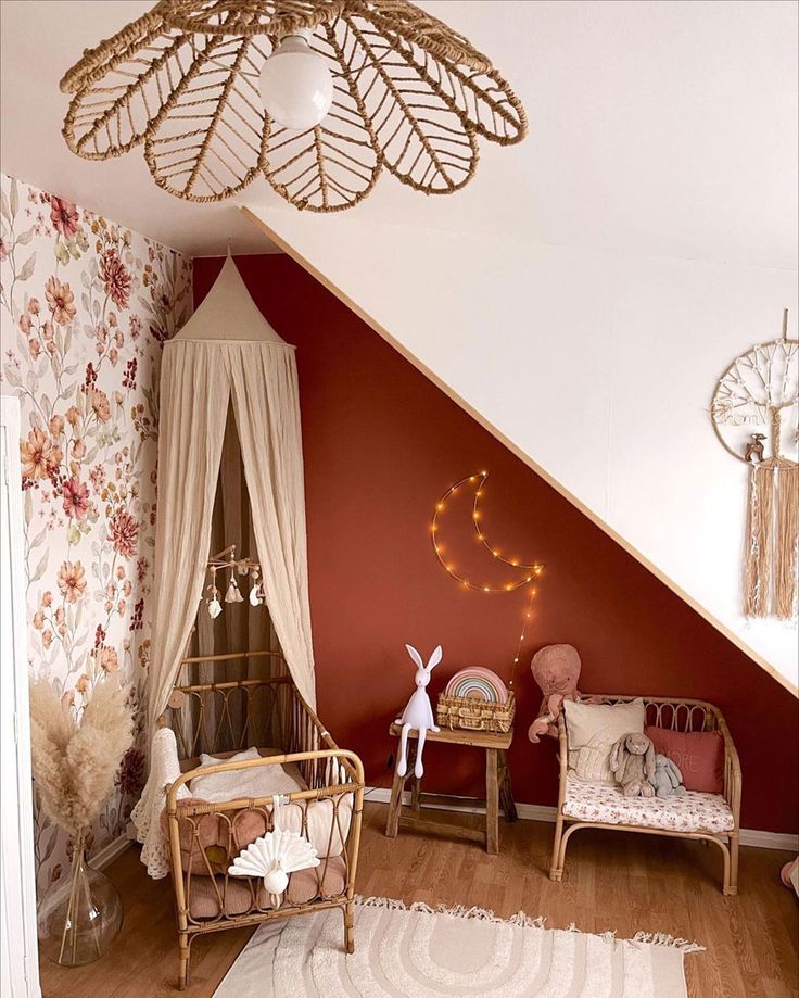 a baby's room decorated in pink and white