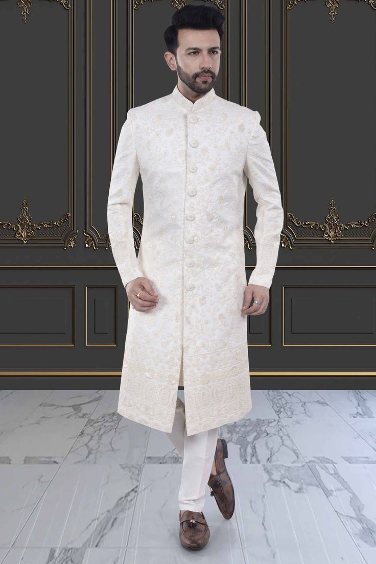 Embody classic elegance with our Mens Sherwani- U2-S379. Featuring delicate thread embroidery adorned with shimmering sequins, this Groom's sherwani exudes sophistication and luxury. Perfect for weddings and special occasions. Elevate your style and make a lasting impression. Festive Long Sleeve Sherwani For Reception, Formal Bandhgala With Chikankari Embroidery For Festive Season, Fitted Nehru Jacket With Naqshi For Transitional Season, Elegant Bandhgala With Resham Embroidery For Diwali, Formal Fitted Nehru Jacket With Chikankari Embroidery, Elegant Diwali Nehru Jacket With Chikankari Embroidery, Formal Bandhgala With Intricate Embroidery For Diwali, Formal Nehru Jacket With Intricate Embroidery For Transitional Season, Elegant Ceremonial Churidar With Resham Embroidery