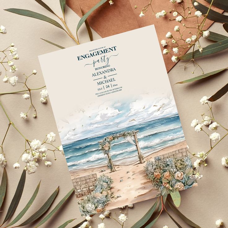 a wedding card with an image of the beach and flowers on it, surrounded by greenery