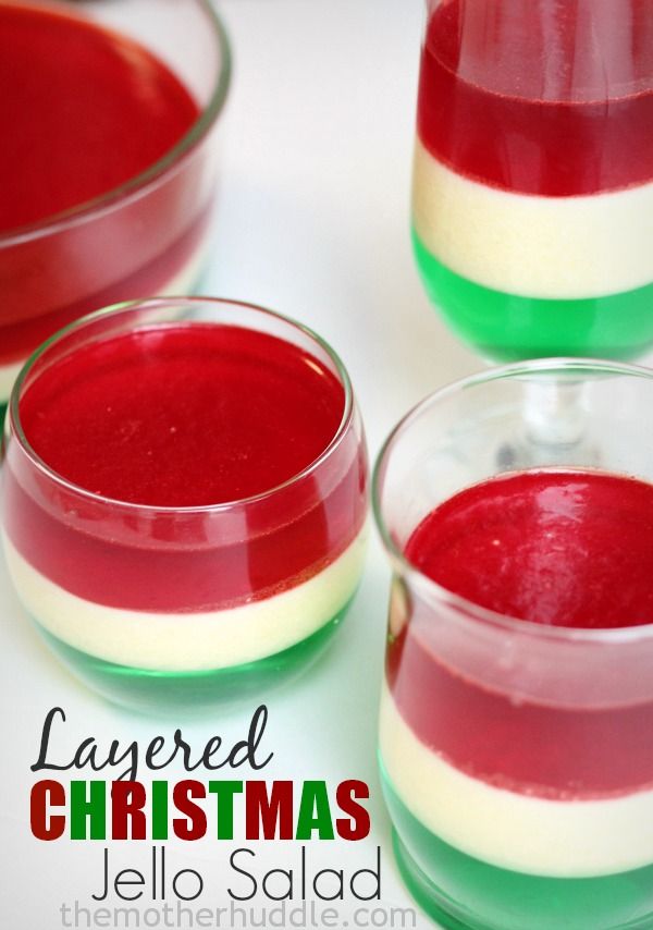 three glasses filled with red, white and green jello