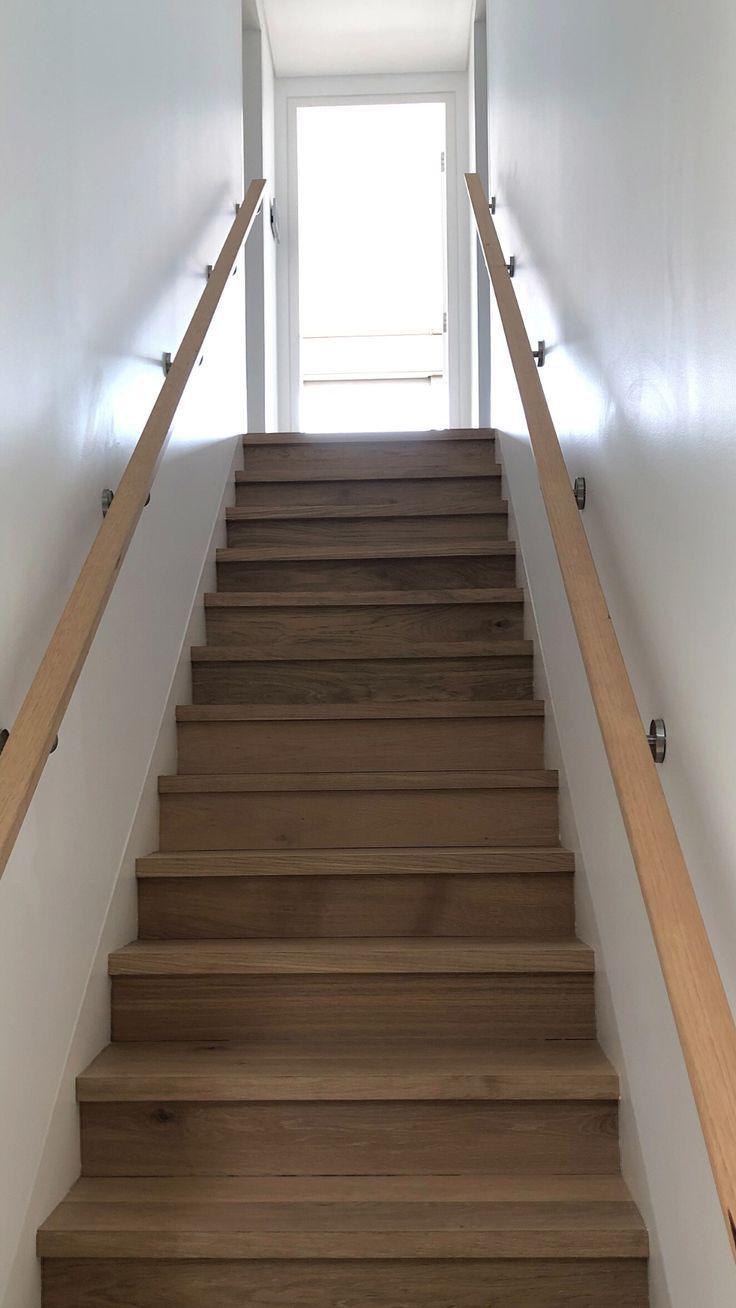 the stairs are made of wood and have no railings