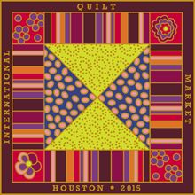 the quilt pattern is shown in red, yellow and purple colors with flowers on it