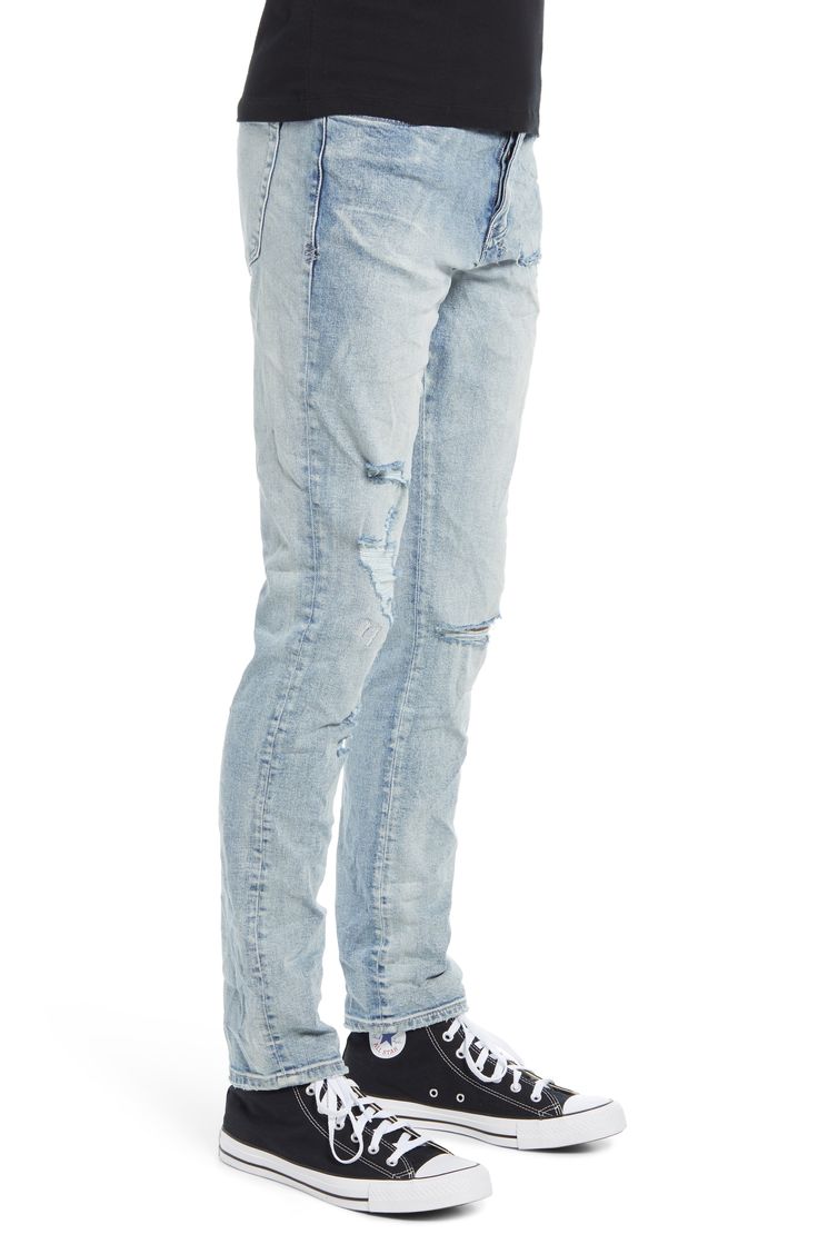 Torn-up style adds edgy appeal to skinny-cut jeans shaped from stretch-cotton denim for a flexible fit. Style Name:Ksubi Chitch Punk Trashed Skinny Fit Stretch Jeans (Philly Blue). Style Number: 6109696. Distressed Fitted Medium Wash Jeans, Distressed Fitted Jeans In Medium Wash, Light Wash Fitted Urban Jeans, Urban Style Light Wash Fitted Jeans, Fitted Light Wash Urban Jeans, Urban Style Fitted Light Wash Jeans, Distressed Slim Fit Cotton Jeans, Slim Fit Distressed Cotton Jeans, Fitted Distressed Washed Blue Bottoms