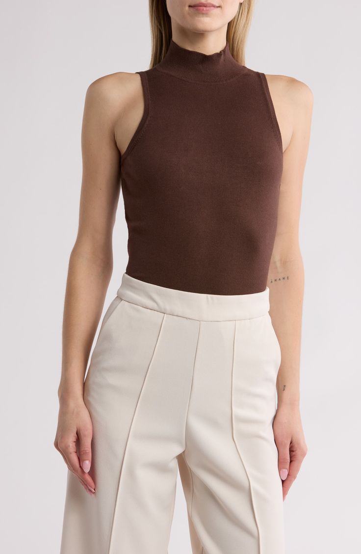 This sleeveless top in an easy, figure-hugging fit is an excellent addition to your chill-time wardrobe. Mock neck Sleeveless 75% rayon, 25% nylon Dry clean Imported Chill Time, Sleeveless Knit Top, Sleeveless Knit, Anchors, Kendra Scott, Cable Chain, Mock Neck, Knit Top, Sleeveless Top