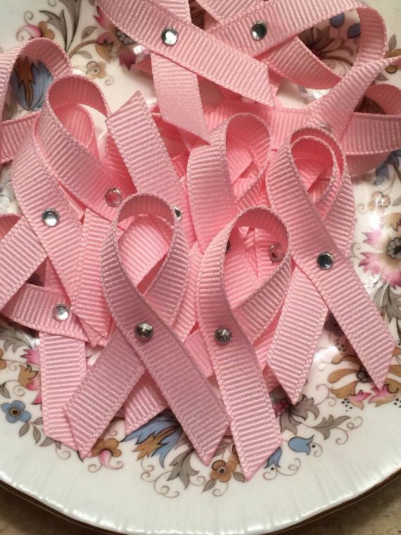 a plate that has some pink ribbon on it