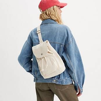 Sling Bag - White | Levi's® US Casual Canvas Bag With Adjustable Strap For Travel, Casual Travel Canvas Bag With Adjustable Strap, Casual Cotton Canvas Bag With Adjustable Straps, Casual Canvas Backpack With Adjustable Strap, Casual Travel Chest Bag With Adjustable Strap, Casual Canvas Chest Bag For Travel, Casual Canvas Chest Bag For Daily Use, Levi's Casual Bags For Everyday Use, Casual Canvas Shoulder Bag With Adjustable Straps