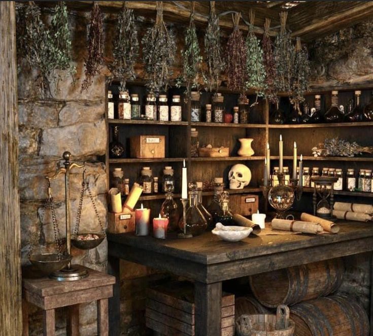 an old fashioned kitchen with lots of bottles on the counter and shelves full of spices