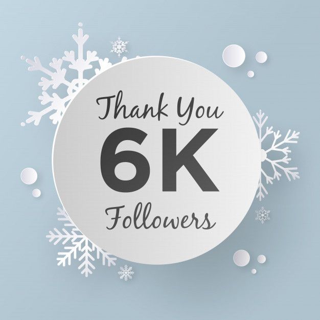 thank you 2k followers with snowflakes on the back and white paper in the middle