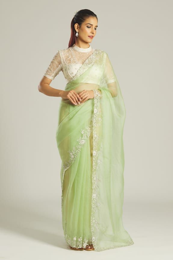 Pastel green organza saree with floral pattern border, contrast pearl, zardozi and aari embroidery. Paired with all over contrast embroidered padded blouse. - Aza Fashions Pista Colour Saree With Contrast Blouse, Pista Green Chanderi Blouse Piece For Reception, Mint Green Saree With Contrast Blouse, Pista Green Organza Saree For Wedding, Green Chanderi Blouse With Sheer Dupatta, Chanderi Green Blouse For Reception, Green Chanderi Blouse For Reception, Traditional Pista Green Organza Blouse Piece, Pista Green Organza Bollywood Traditional Wear