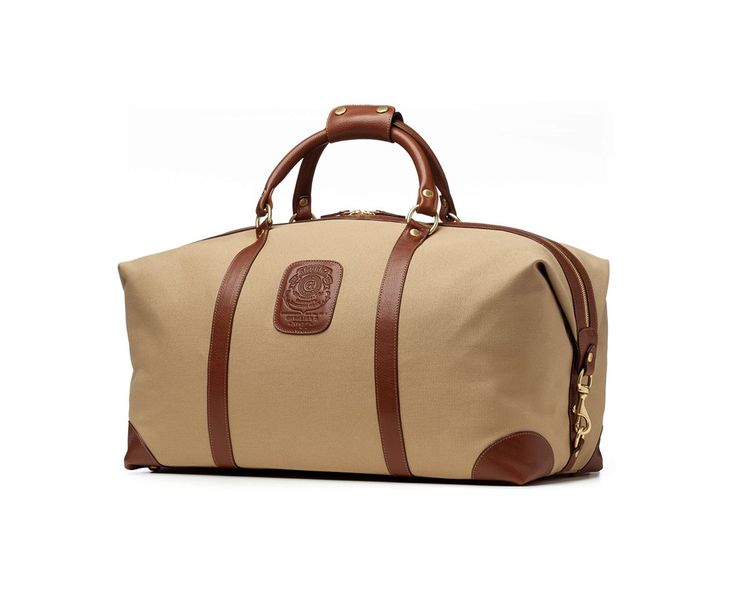 With its classically handsome looks and expandable design, the Cavalier II is your trusty partner for everything from short business trips to weekend getaways. Leather Duffel Bag, Leather Duffel, Chestnut Leather, Leather Duffle Bag, Leather Duffle, Classic Bags, Orange Leather, Mid Size, Color Khaki