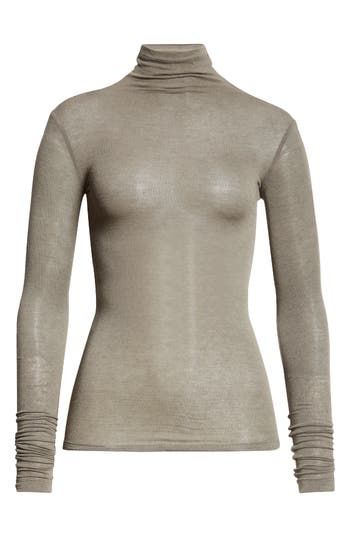 Love to layer—or make a sultry statement—in this semisheer sweater made from a wool-enriched blend. Timeless with a twist, this knit takes inspiration from traditional Vietnamese craftsmanship and contemporary design—hallmarks of Lam Gia Khang's eponymous label. 24" length (size 34FR) Turtleneck Long sleeves Semisheer 82% viscose, 9% polyurethane, 9% wool Dry clean Imported Elegant Sheer Crew Neck Top, Sheer Tops For Winter Layering, Elegant Fine Knit Tops For Layering, Sheer Long Sleeve Sweater For Fall, Elegant High Neck Sweater For Layering, Sheer Tops For Fall Layering, Sheer Tops For Layering In Fall, Sweater Making, Turtleneck Sweater