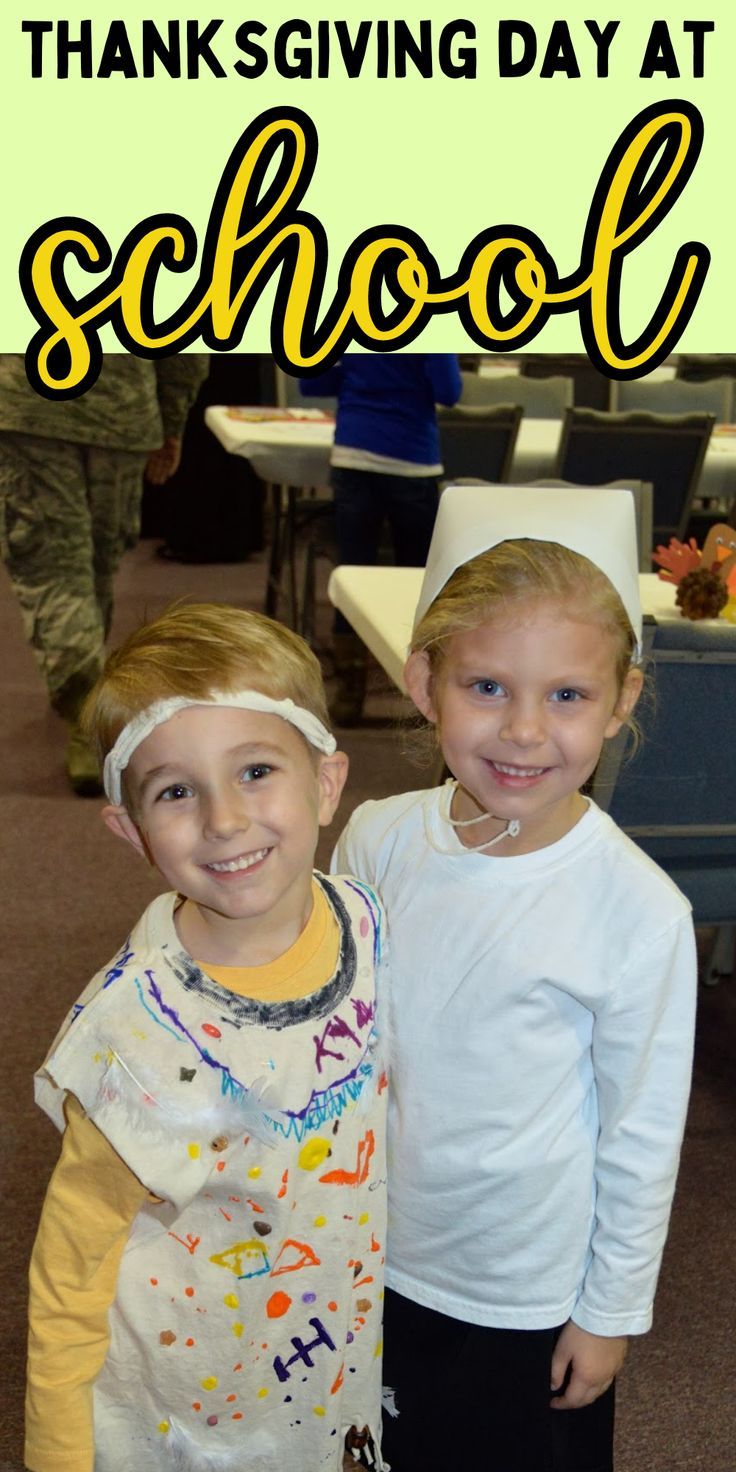 two young children standing next to each other with the words thank giving day at school