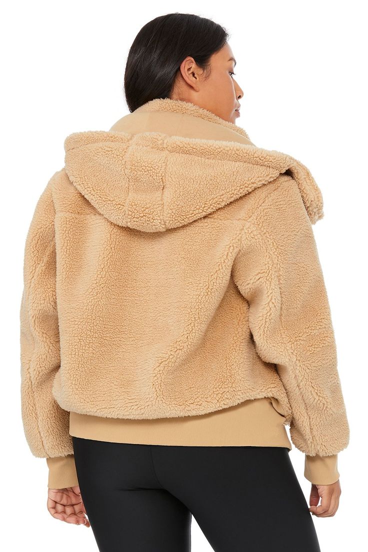 Easy come, easy go. Cut from cozy sherpa and equipped with a removable hood and zip pockets, our ultra-comfy Foxy Sherpa Jacket will get you to the studio every time. Features a front-zip closure, oversized silhouette and ribbed cuffs and hem. On-trend oversized fit Removable hood & zippered pockets Designed to work from studio to street Wear-tested by our in-house team for the perfect fit Foxy Sherpa Jacket in Camel, Size: XS | Alo Yoga® Alo Yoga Hooded Outerwear For Winter, Cozy Long Sleeve Alo Yoga Outerwear, Alo Yoga Cozy Long Sleeve Outerwear, Alo Yoga Long Sleeve Outerwear With Ribbed Cuffs, Alo Yoga Winter Outerwear With Ribbed Cuffs, Alo Yoga Fall Outerwear In Solid Color, Alo Yoga Hooded Outerwear With Drawstring, Alo Yoga Fall Outerwear With Drawstring Hood, Alo Yoga Drawstring Hood Outerwear For Fall