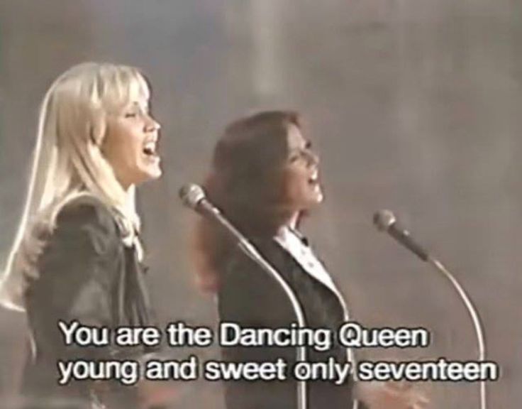 two women standing next to each other in front of microphones with the words you are the dancing queen, young and sweet only seven