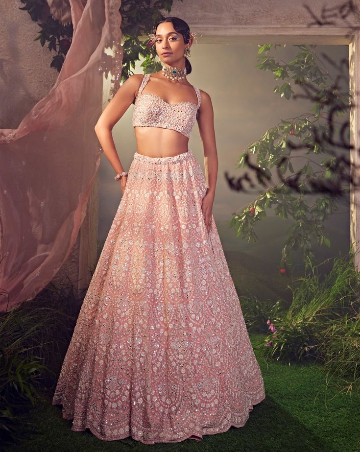 Featuring an orchid pink organza lehenga with white thread work. It is embellished with sequence and bugle beads.From Aneesh Agarwaal's Ellora collection.DELIVERY TIMEPlease allow 8-12 weeks for your outfit to arrive.FABRIC DETAILSOrganzaProfessional cleaning only. Pink Organza Lehenga, Tulle Lehenga, Organza Lehenga, Traditional Indian Dress, Padded Blouse, Pink Lehenga, Beaded Neckline, Indian Wedding Outfits, Lehenga Designs