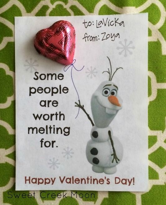 a valentine's day card with a heart shaped candy