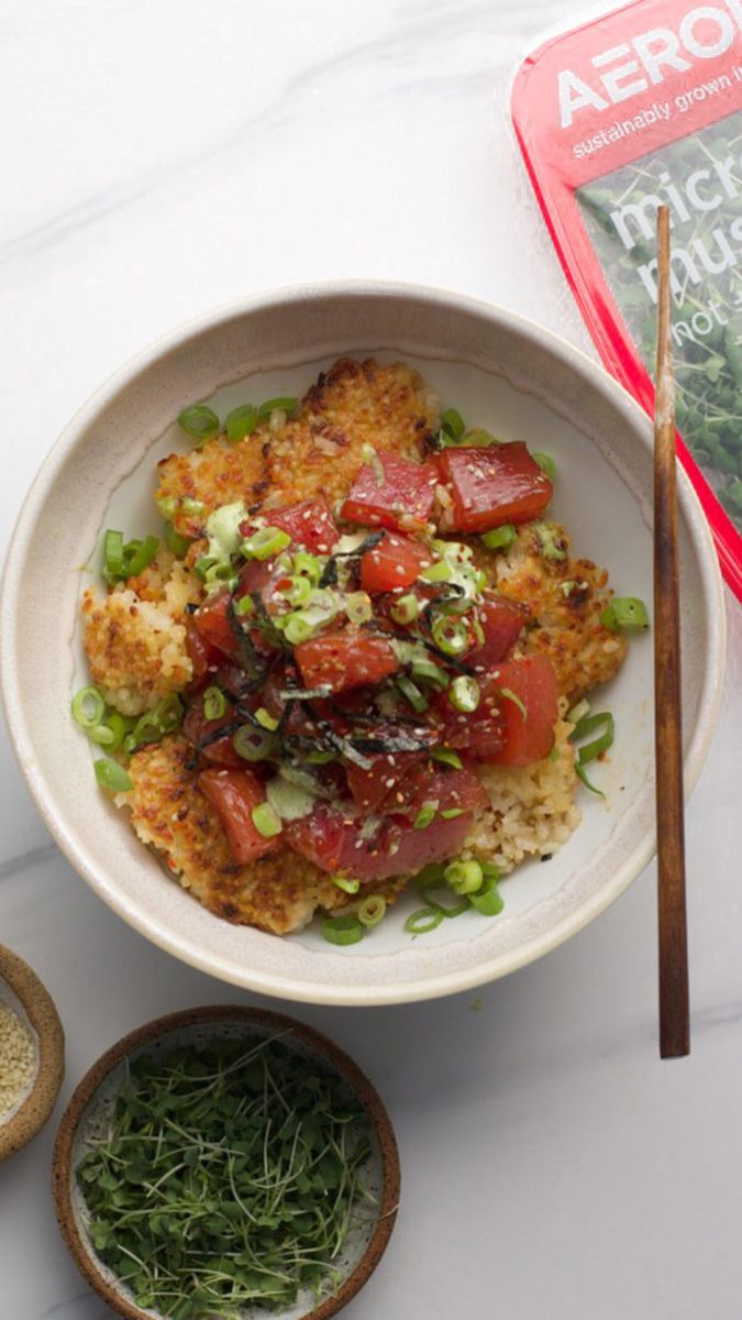 Poke bowl with tuna, crispy rice scallions, an sesame seeds Sticky White Rice, Wasabi Aioli, Tuna Poke Bowl, Raw Tuna, Tuna Poke, Poke Bowl, Toasted Sesame Seeds, Sushi Rice, Rice Crispy