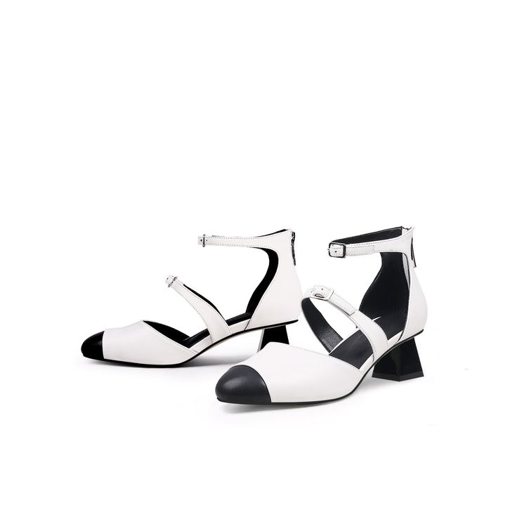 White Spring T-strap Sandals With Block Heel And Buckle Closure, Spring T-strap Sandals With Buckle And Block Heel, Spring T-strap Sandals With Block Heel, Spring T-strap Sandals With Block Heel And Heel Strap, Chic T-strap Sandals With Block Heel For Spring, Chic Flat Heel T-strap Sandals For Spring, Chic Closed Toe T-strap Sandals For Spring, Spring Flat Heel Heels With Buckle Closure, Spring T-strap Sandals With Stacked Heel And Ankle Strap