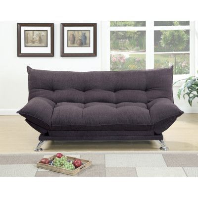 a futon sofa bed in a living room