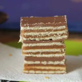 three pieces of cake are stacked on top of each other