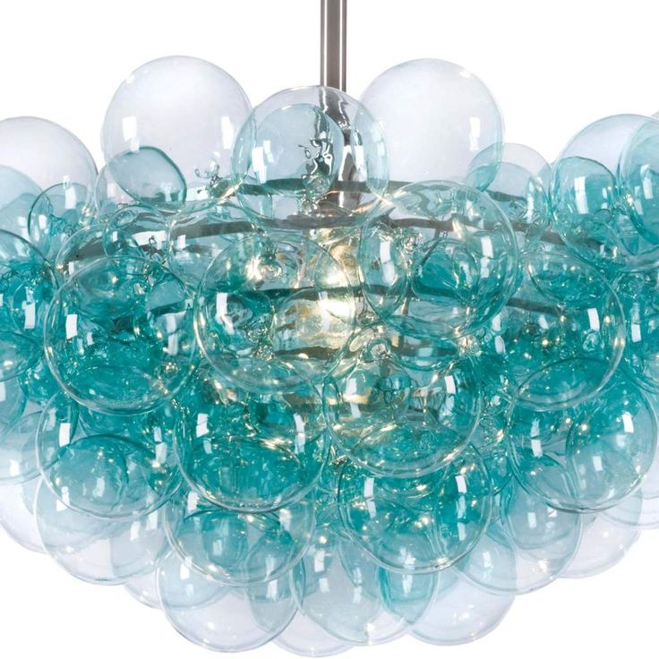 a chandelier made out of glass balls