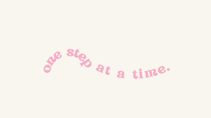 the words one step at a time written in pink ink