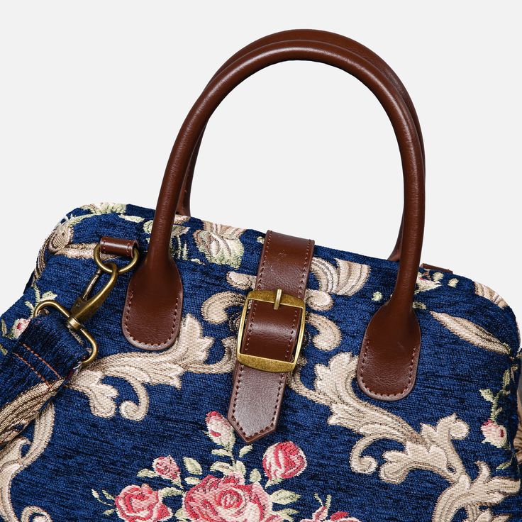 With a nod to the Victorian era, MCW’s freshly combines the classic and elegant design of the traditional carpet bag with a textural and tactile twist.The main body of purse-sized bags is made with thick chenille carpets. The handles and belts are genuine leather with heavy cotton canvas lining. Six bronze stands at the bottom allow the bag to stand stably. Every bag comes with a detachable and adjustable shoulder strap (55 inches) made from the same chenille as the bag and fixed with high-quali Vintage Tote Bag With Adjustable Handle, Vintage Blue Bag With Detachable Strap, Vintage Blue Top Handle Satchel, Vintage Blue Bag With Leather Handles, Vintage Blue Bags With Leather Handles, Vintage Blue Double Handle Bag, Vintage Blue Shoulder Bag With Leather Handles, Vintage Blue Double Handle Shoulder Bag, Vintage Blue Top Handle Bag