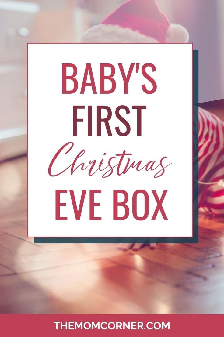 a baby's first christmas eve box on the floor