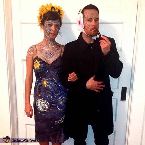 the man and woman are dressed up in costumes