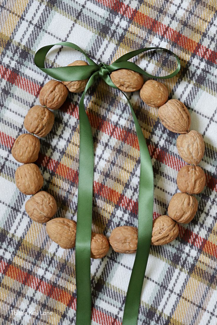 a green ribbon with nuts tied to it