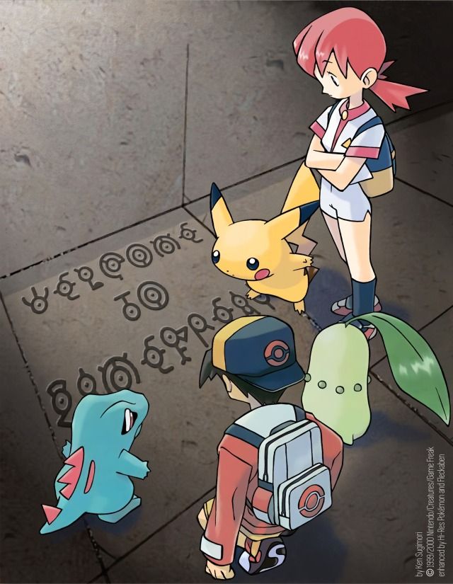 the pokemon characters are standing in front of each other and looking at something on the ground