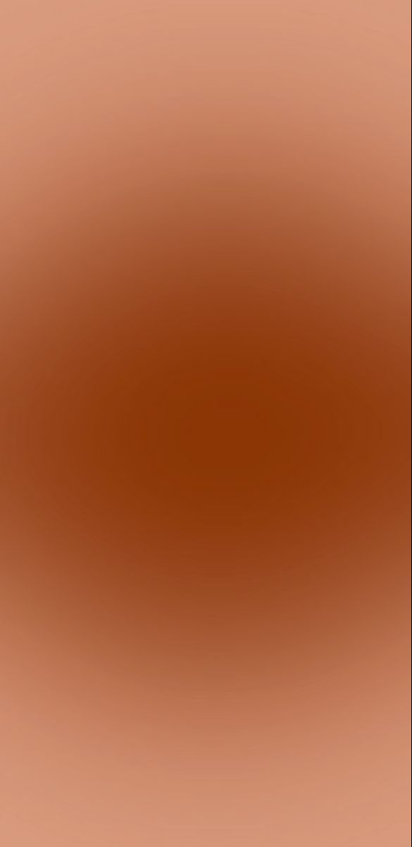 a blurry image of an orange and brown background